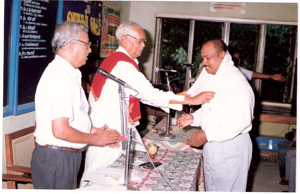  BEING FELICITATED BY CENTRAL LIBRARY OFFICIALS 